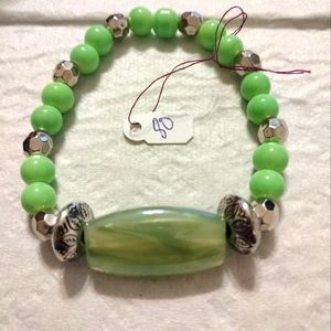 Artemis's Gems custom-made beaded bracelet with large green gem and metal beads